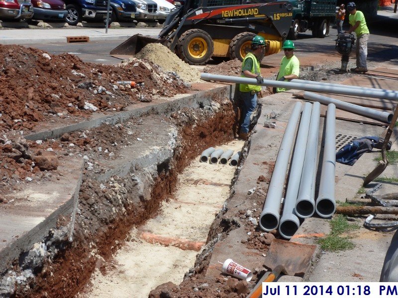 Continued installing the underground Tele-Data piping at Rahway Ave. Facing the Administration Building (800x600)
